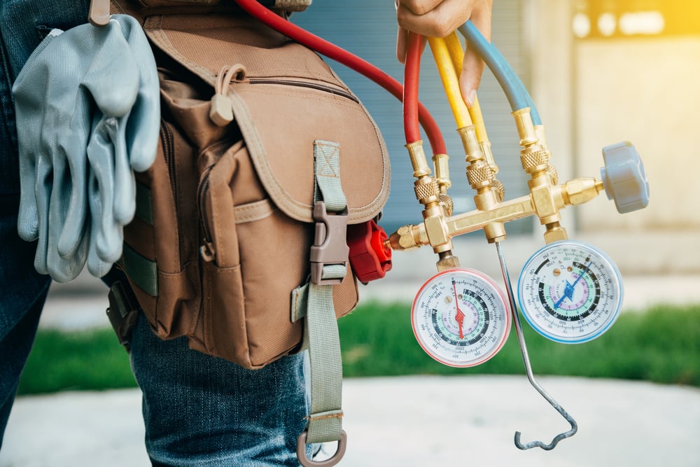 Air,Conditioning,Technician,And,A,Part,Of,Preparing,To,Install