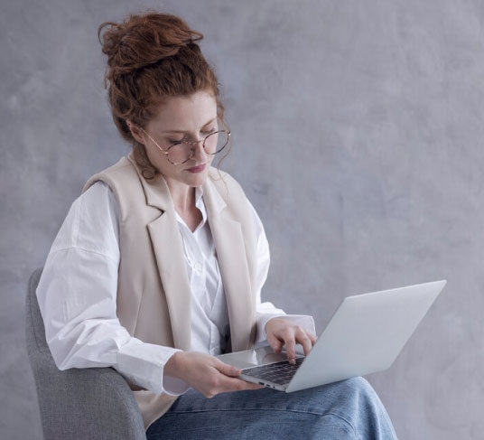 person-searching-on-laptop